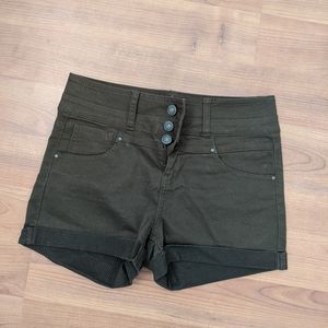 Khaki green button fly shorts.